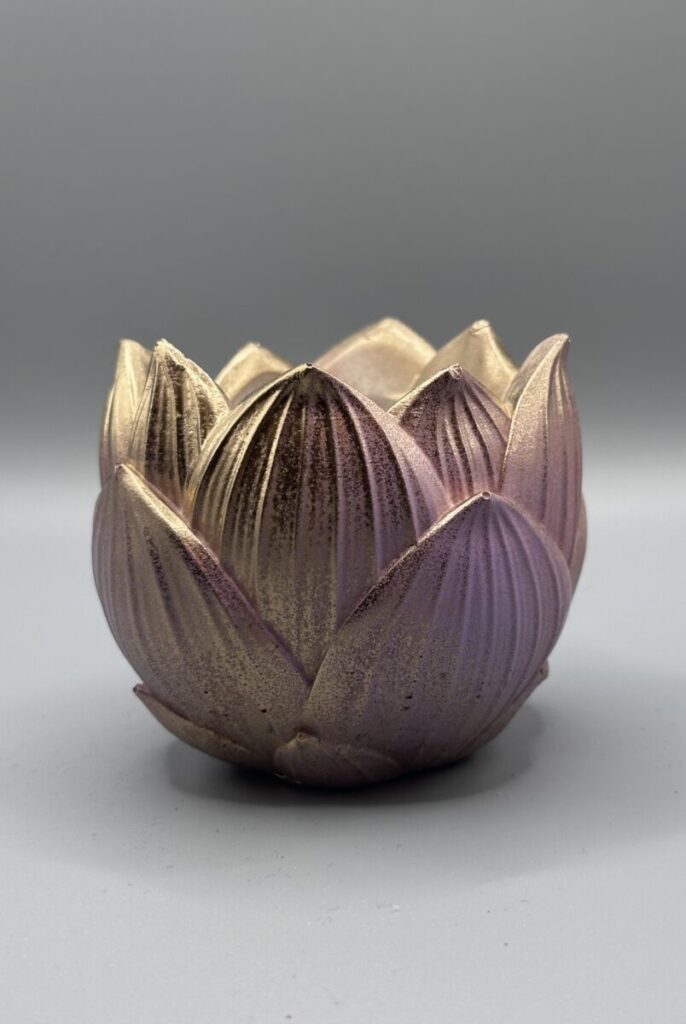 Discover the "Serenity Bloom" Lotus Planter at Boba's Plant. A handcrafted, rose-gold shimmering pot perfect for succulents or tea lights. Shop unique, zen-inspired decor today!